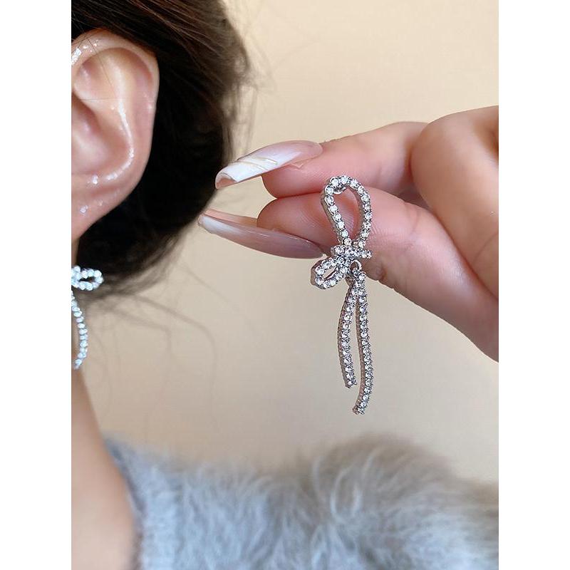 S925 prata agulha piscando diamante arco brincos feminino luz luxo High-End temperamento brincos longos 2026 brincos de 