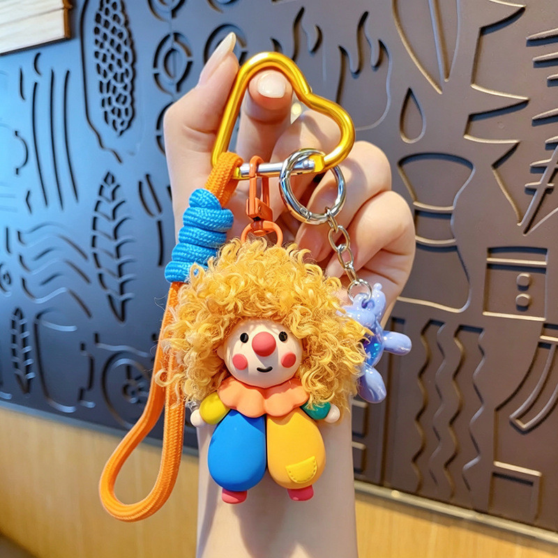 Chaveiro de palhaço com cabelos cacheados em estilo cartoon, adorno de bolsa em formato de boneca fofa, pequeno presente