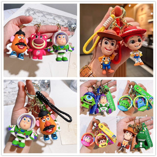 Chaveiro com personagens de desenho animado de «Toy Story», incluindo Buzz Lightyear, Woody, Jessie, Strawberry Bear, Wo