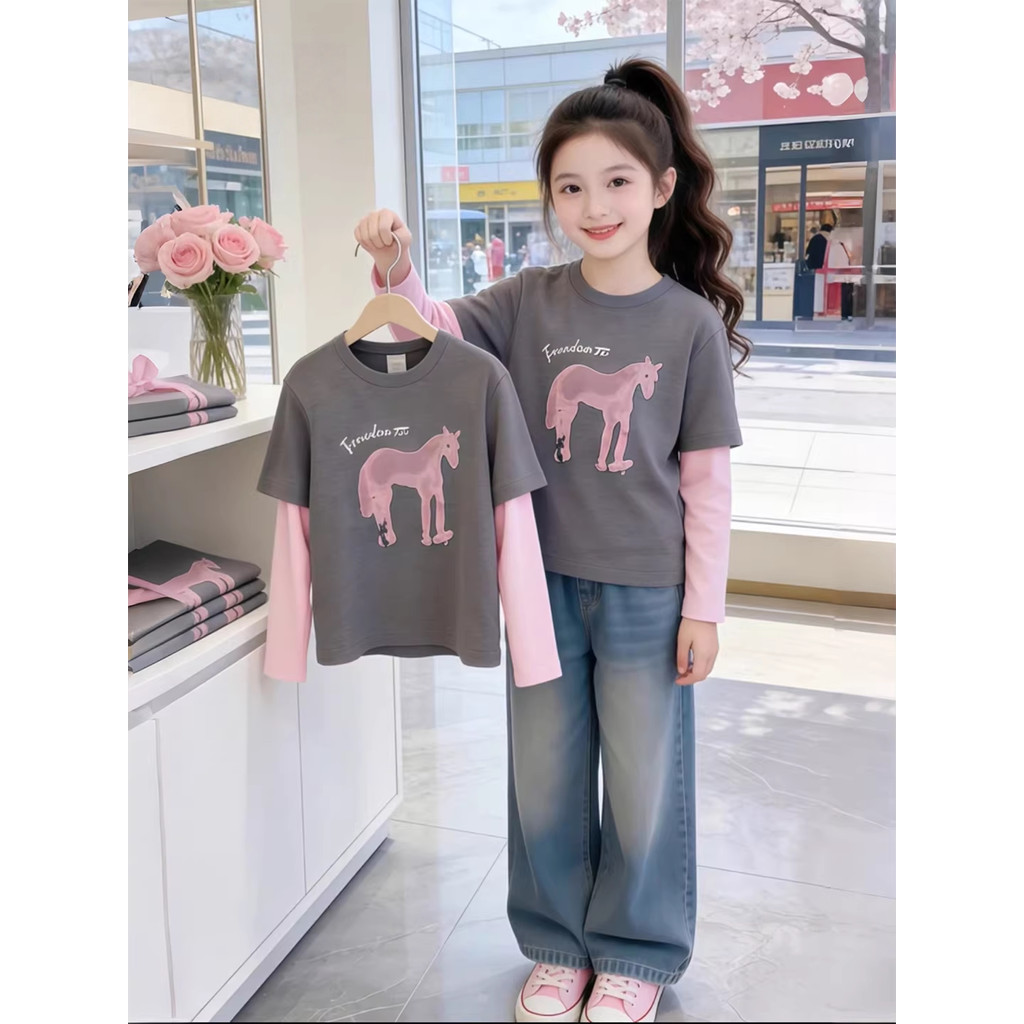 Meninas de manga comprida camiseta 2026 primavera versão coreana dos desenhos animados cavalo impressão falso de duas pe