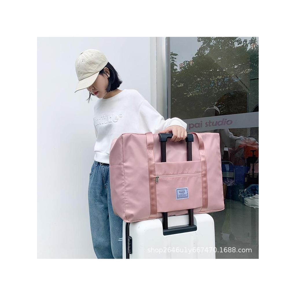 Bolsa de viagem dobrável de grande capacidade feminina bolsa de bagagem esportiva portátil de curta distância em movimen