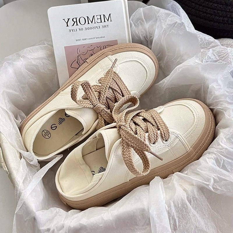 Creme dois desgaste sapatos de lona feminino 2026 verão novo estilo versão coreana sapatos brancos dedo do pé redondo so