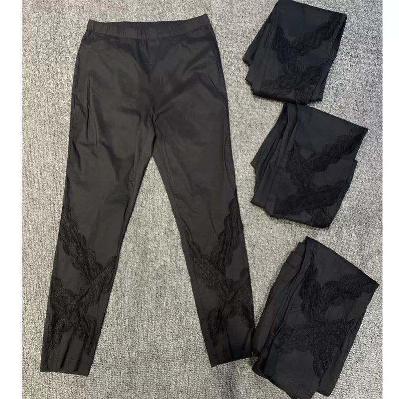 Calças de couro de papel femininas finas renda de oito pontos oco estiramento estilo Slim fit