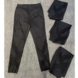 Calças de couro de papel femininas finas renda de oito pontos oco estiramento estilo Slim fit