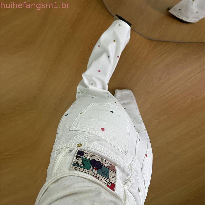 Outono novo estilo solto mais magro olhar versão coreana colorido bordado flores bege Denim calças de perna larga femini