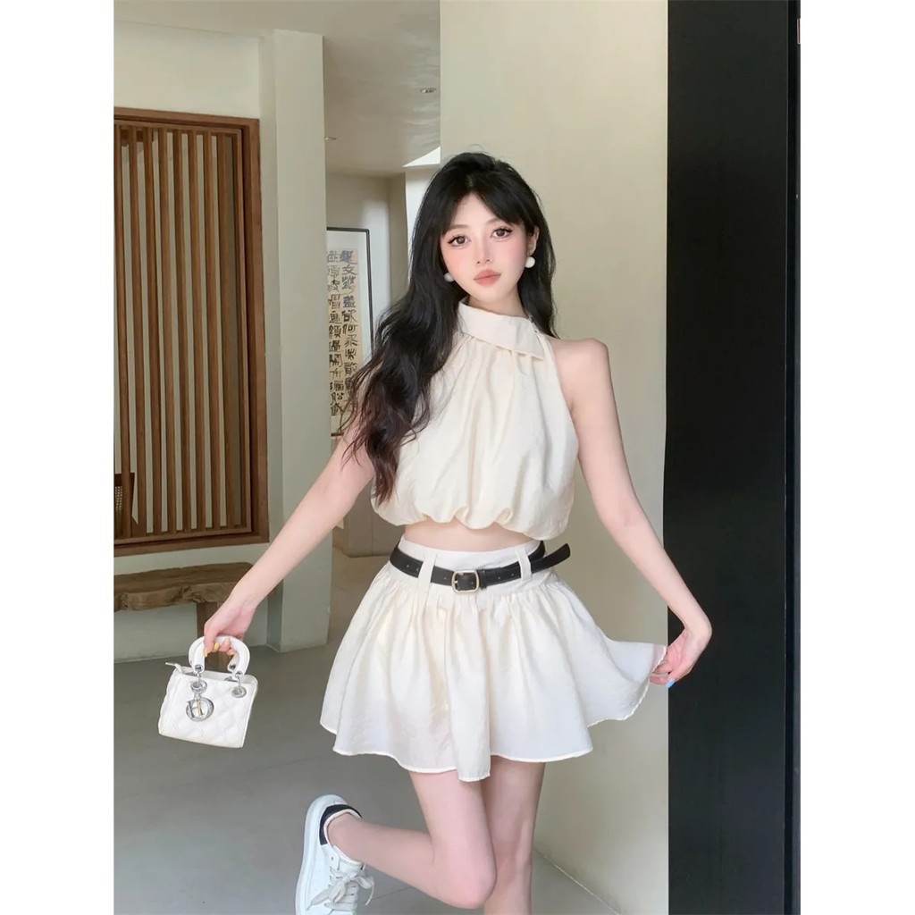 Terno bonito Popular deste ano saia feminina verão topos usar um conjunto completo saia plissada estilo Yujie frito rua 