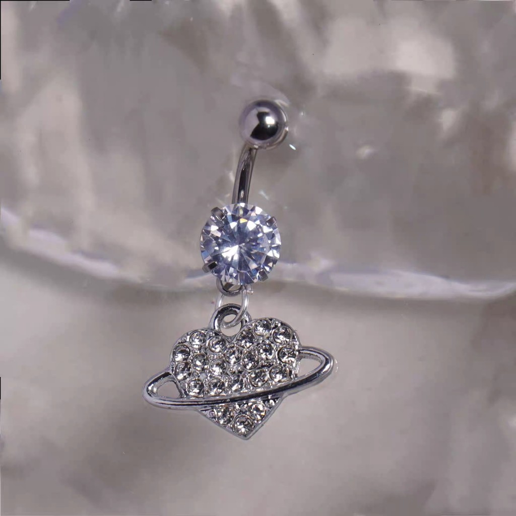 Piercing de Umbigo com Coração Planetário Cravejado – Zircônia Brilhante