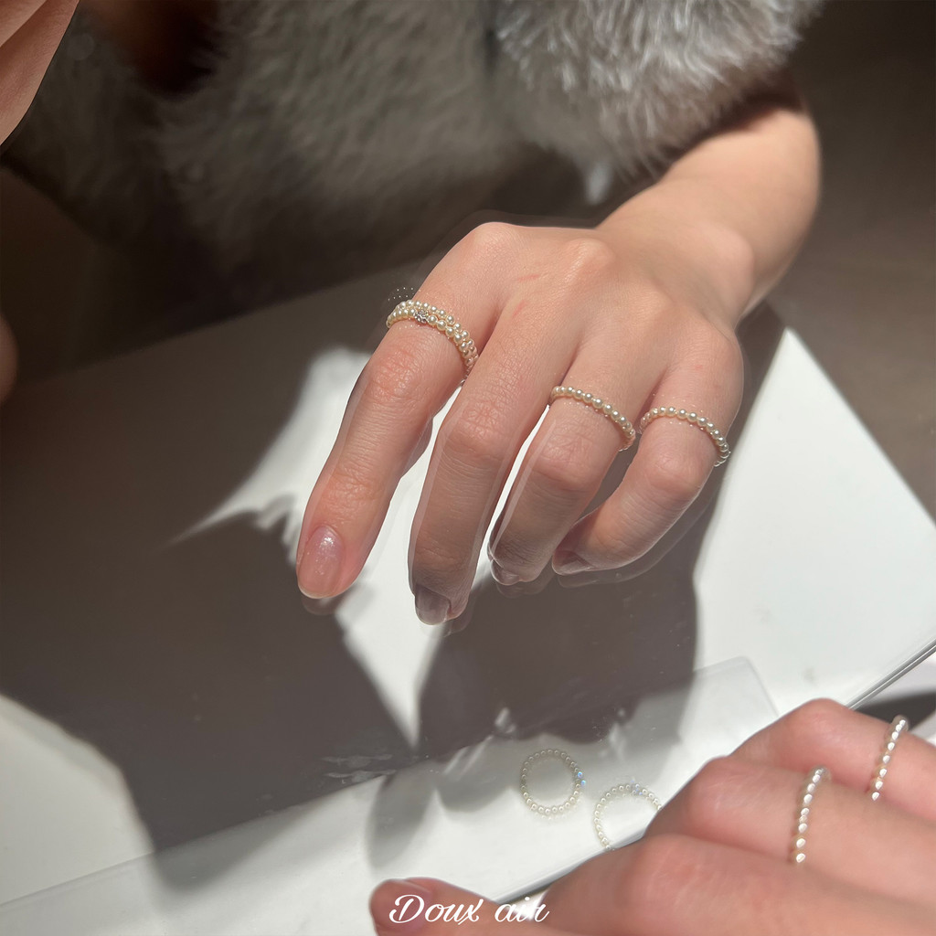 DouxAir Shijia anel de pérola anel liso empilhado cristal diamante anel luz luxo High-End ins na moda anel de cauda femi