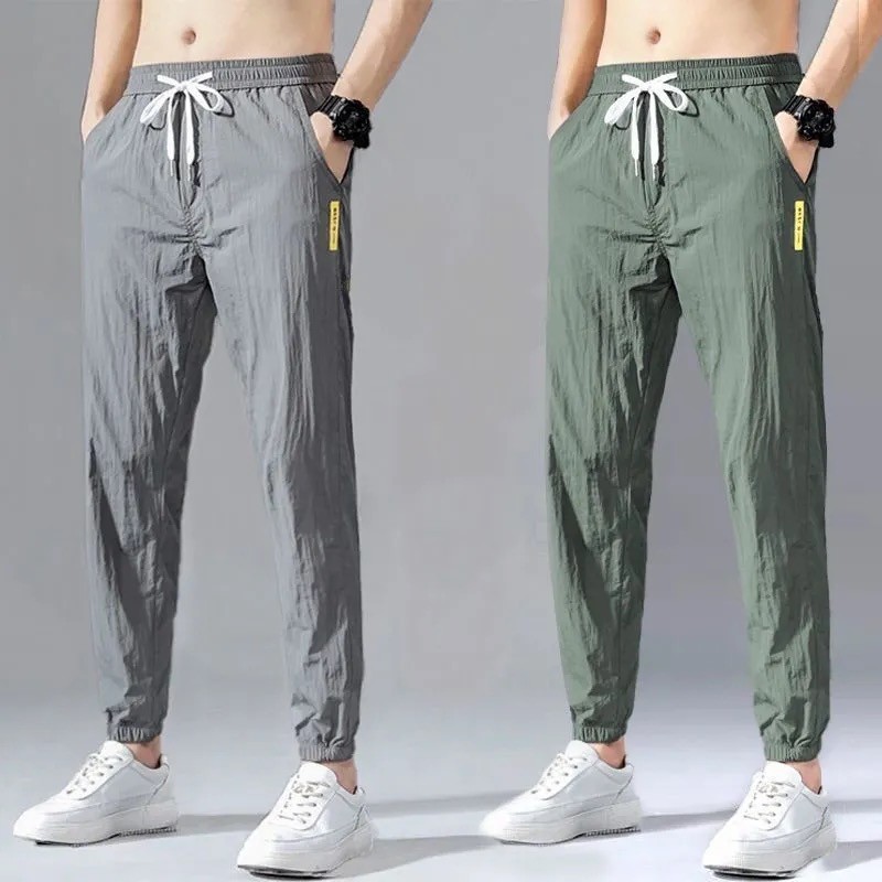 Verão Ultra-fino calças de seda gelo masculino na moda Leggings calças esportivas soltas tornozelo comprimento Casual se