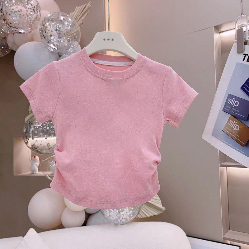 Crianças de manga curta feminina 2026 novo estilo de venda quente moda algodão camiseta em branco simples All-Match moda