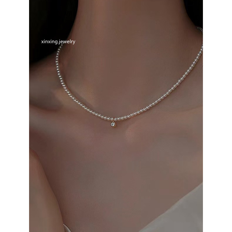 colar femenino colar aço inoxidável Shijia forte luz pérola clavícula corrente pequena pérola colar novo estilo de ven
