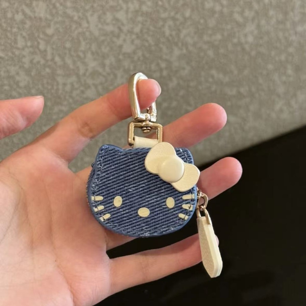 Chaveiro de bolsa de couro Hello Kitty, boneco de pelúcia moderno, divertido e de alta qualidade.