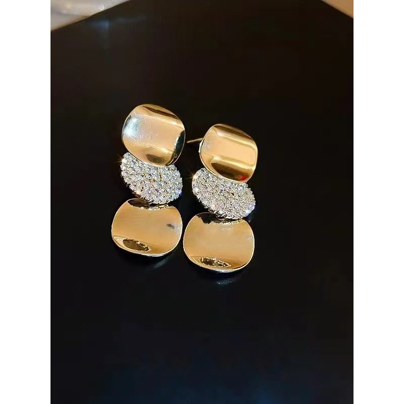 Brincos de liga de cobre brincos geométricos cravejados de diamantes luz luxo estilo longo brincos de temperamento 2026 