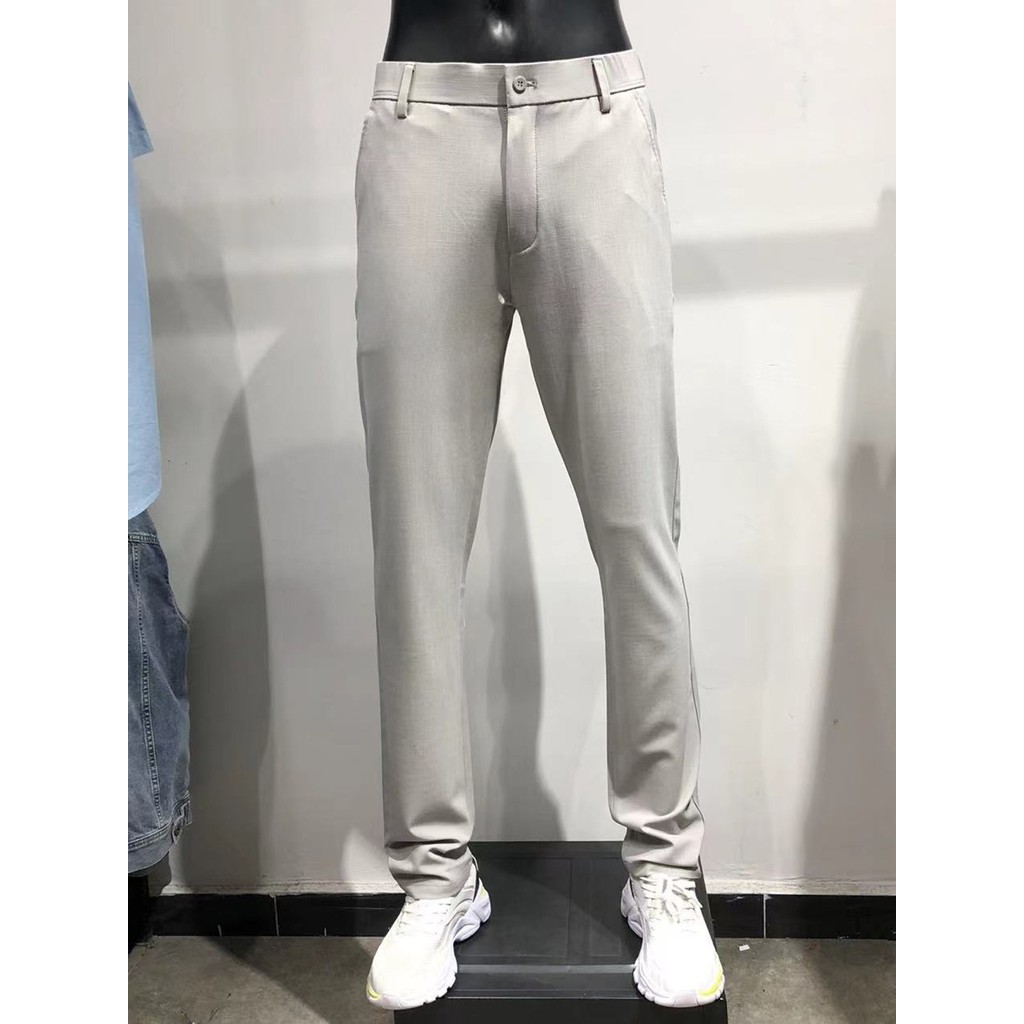 Marca roupas masculinas Jck Jns masculino fino-ajuste magro calças casuais cinza estiramento calças masculinas de negóci