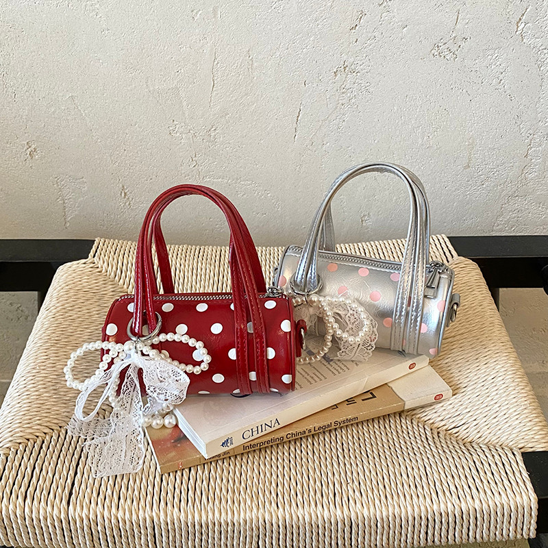 Jardim de infância bebê moda bolinhas saco do mensageiro nicho pequena princesa moda portátil cilindro saco travesseiro