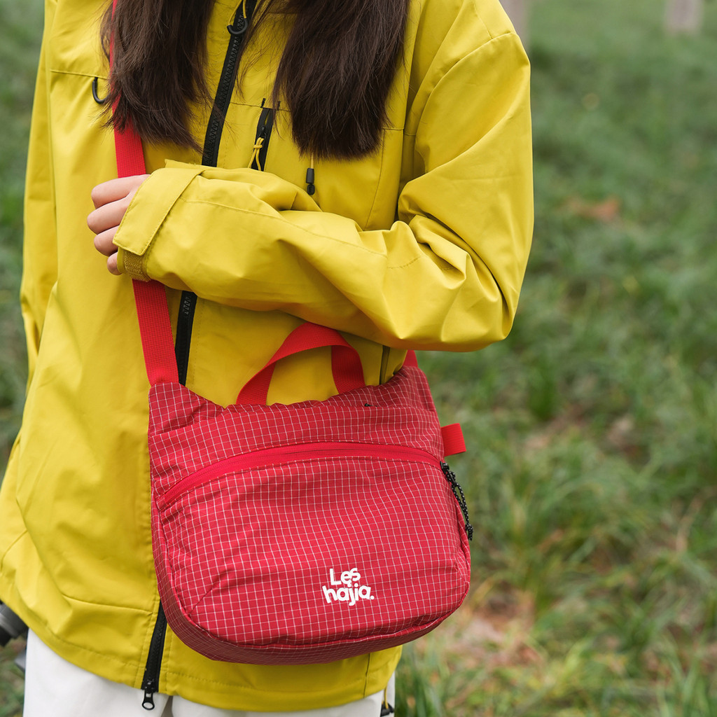 Bolsa mensageiro feminina 2026 primavera novo estilo esportes montanhismo lazer saco casal Commuter caminhadas ao ar liv