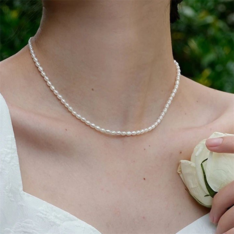 Colar de pérolas de imitação de camada única nicho Oval colar de pérolas corrente de clavícula joias de aço de titânio