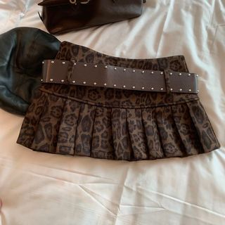 Saia curta com estampa de leopardo estilo americano, cintura alta, saia plissada anti-exposição, novo estilo para garota