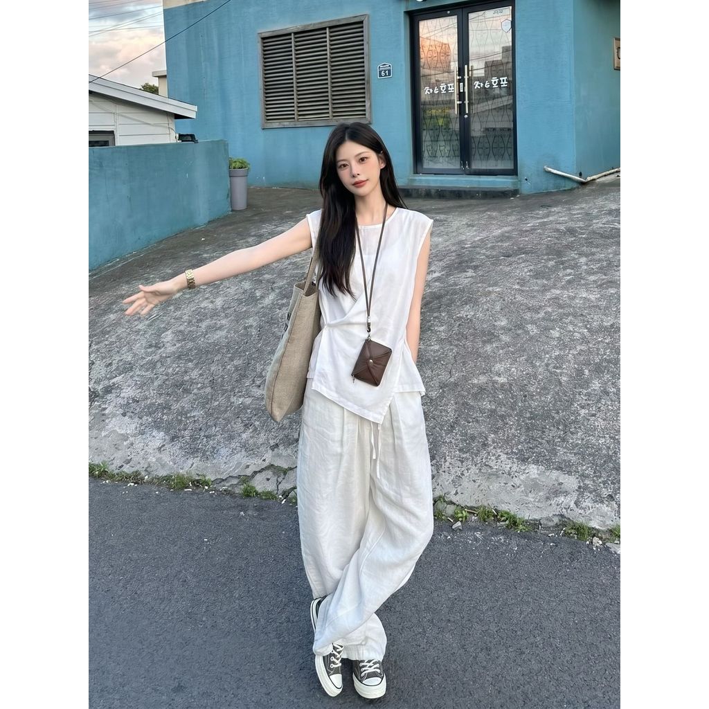 Estilo de dinheiro antigo High-End sentimento pequena manga voadora camiseta de manga curta feminina Irregular cruz Desi