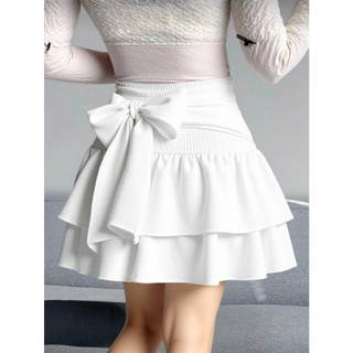 Saia curta casual estilo boho, com laço contrastante, bainha com camadas e folhos, ideal para a praia, bainha com camada