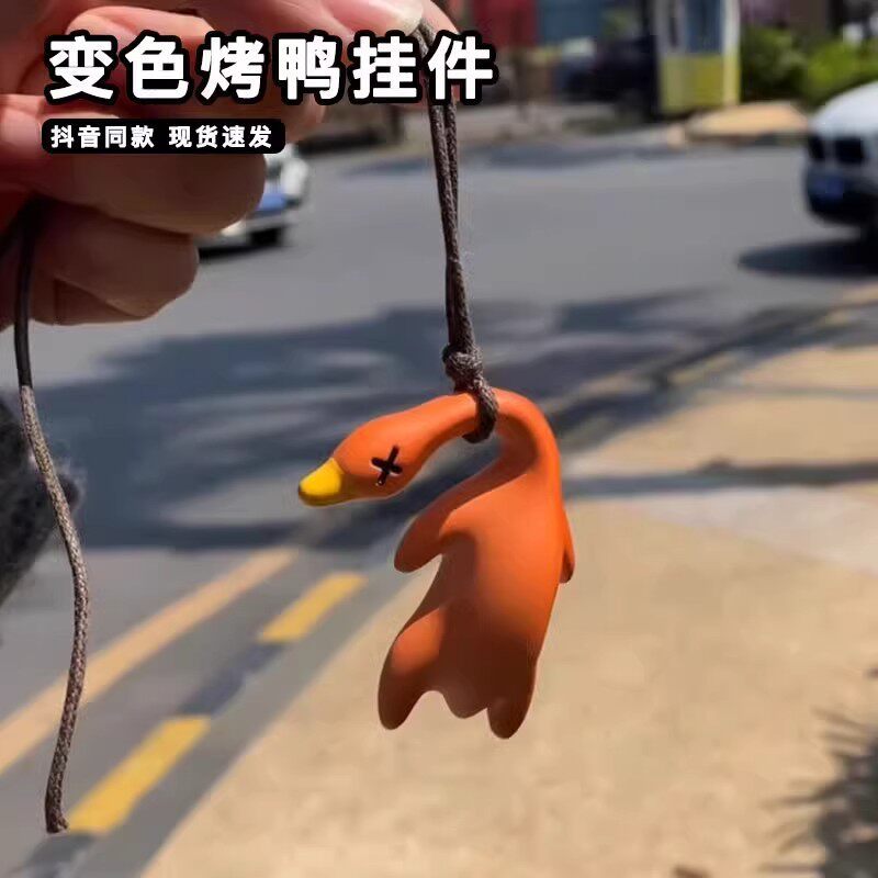 Pingente de pato para assar que muda de cor, raio ultravioleta, mudança de cor, tecnologia preta, brinquedos criativos, 