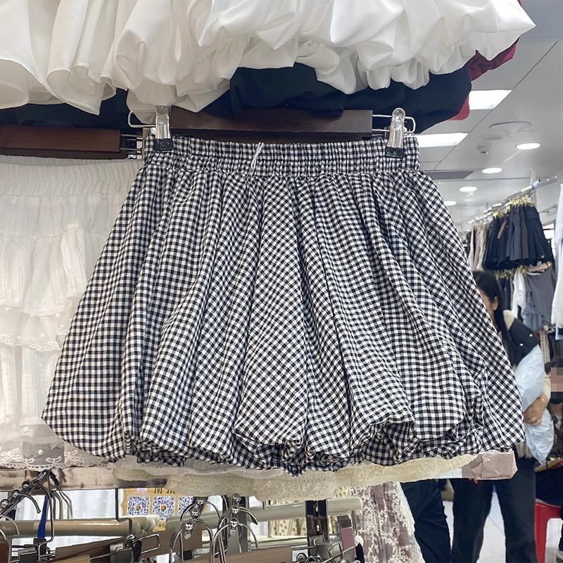 Pequeno contraste cor xadrez Bud saia feminina 2025 primavera novo estilo Anti-reflexo A linha Puff saia