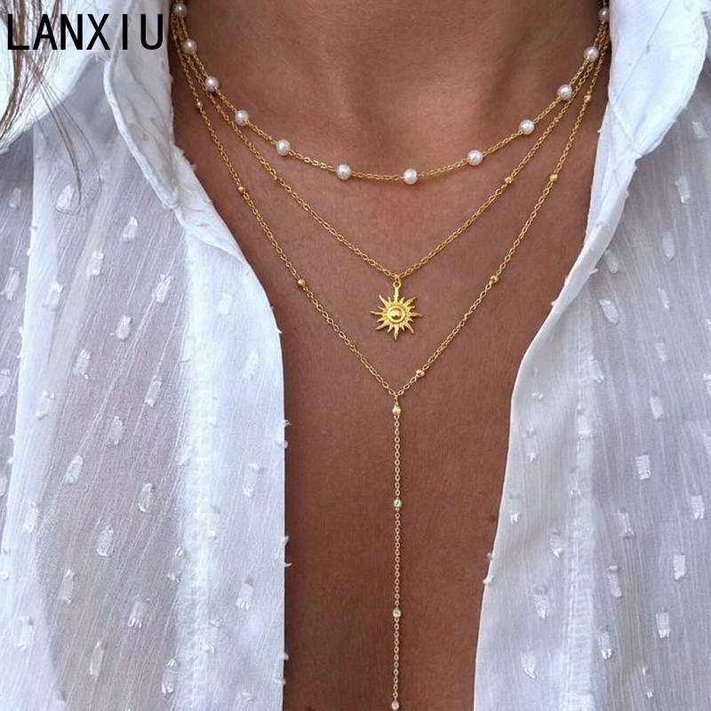 Colar com pingente de sol em camadas LANXIU, corrente de pérolas banhada a ouro, colar boho em Y, colar longo para mulhe