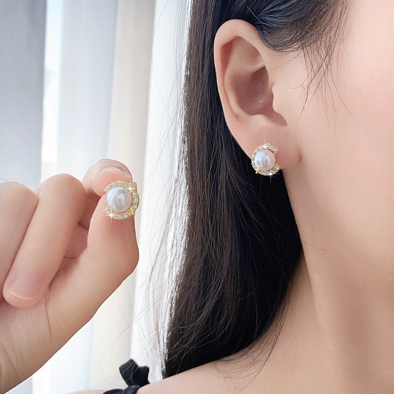 Luz de luxo nicho diamante pérola brincos S925 prata agulha brincos único borla brincos verão High-End brincos femininos