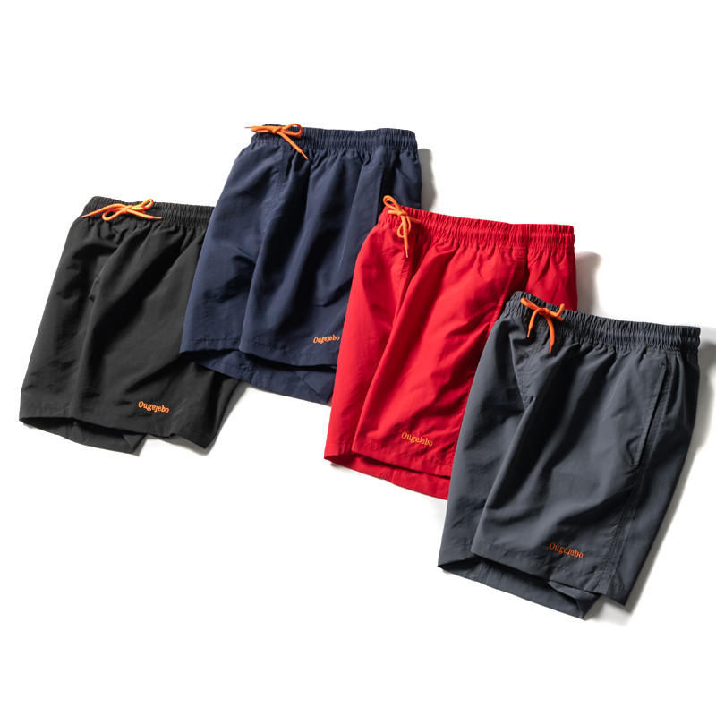 Bom produto alemão!Cintura elástica masculina verão treinamento de Fitness solto correndo Shorts casuais bordados calças