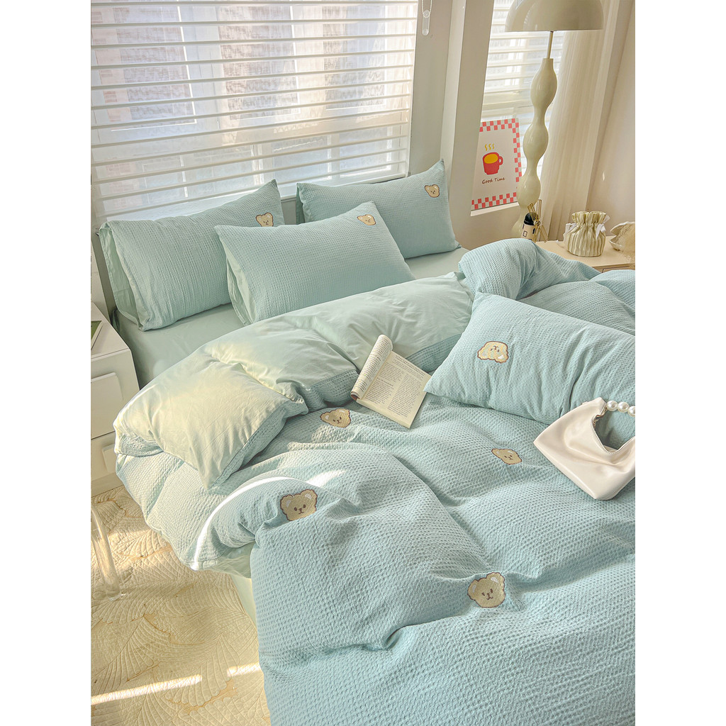 2026 estilos estilo creme urso bordado conjunto de quatro peças puro algodão Waffle colcha capa lençol Nantong cama