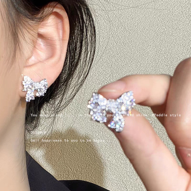 Drama coreano mulher ~ legal piscando diamante arco brincos nicho Design High-End brincos luz luxo moda brincos feminino