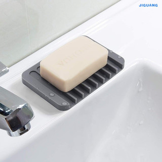 O porta-sabão de silicone com função de drenagem mantém o sabão limpo.