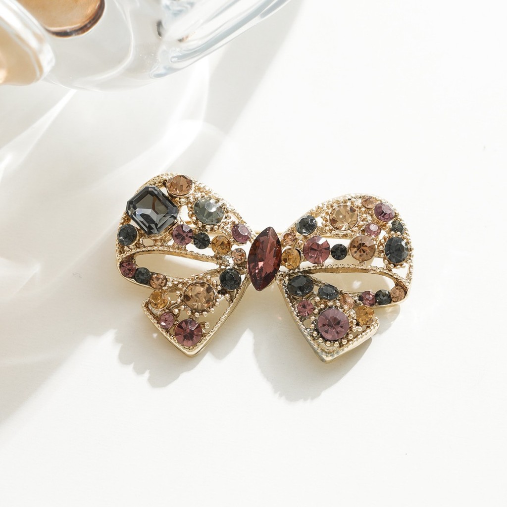 Versão coreana moda Retro arco broche na moda senhoras broche nova liga diamante pino acessórios de roupas na moda