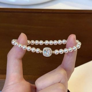 Imitação de pérola pulseira feminina 2026 nova luz de venda quente nicho de luxo High-End Design temperamento pulseira n