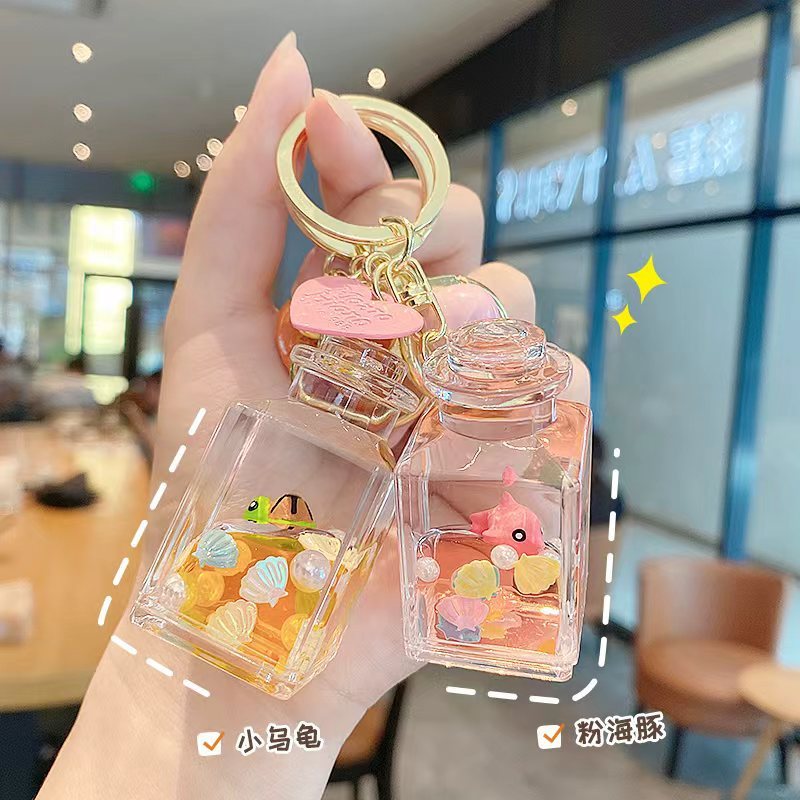 Flutuante pequeno peixinho Glitter garrafa chaveiro bonito óleo deriva garrafa pingente estudante mochila pingente prese