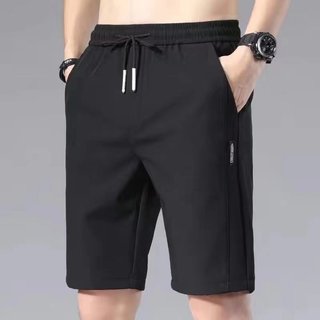 Verão fino calças cortadas dos homens Shorts casuais de seda gelo solto na moda calças médias 5 pontos calças soltas