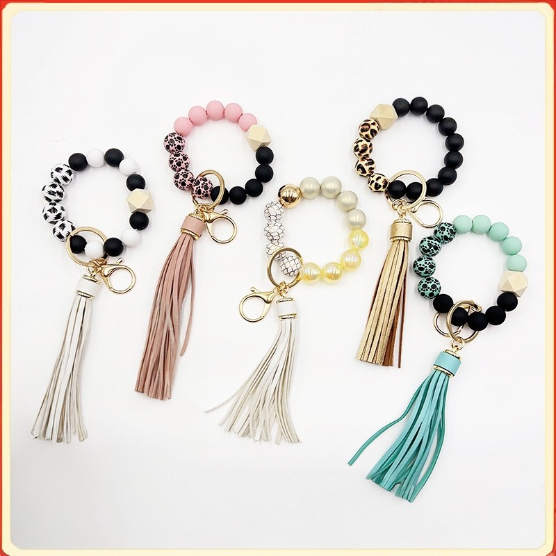 Log borla Silicone frisado chaveiro criativo pulseira anel de pulso influenciador feminino saco pingente All-Match peque