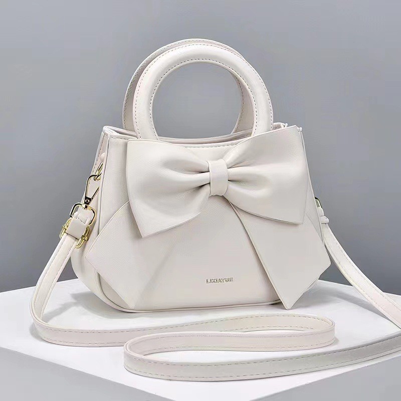 Bolsa feminina Taizhou, moderna, versátil, com laço, luxo leve, bolsa de mão, bolsa de ombro, bolsa transversal, bolsas