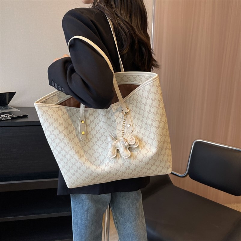 Bolsa feminina de grande capacidade 2025 novo estilo All-Match textura de alta qualidade bolsa de ombro portátil bolsa d