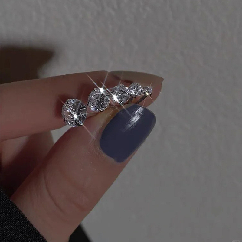 Brincos de aço de titânio brincos de caracol feminino s925 agulha de prata High-End nicho brincos de diamante novo ataca