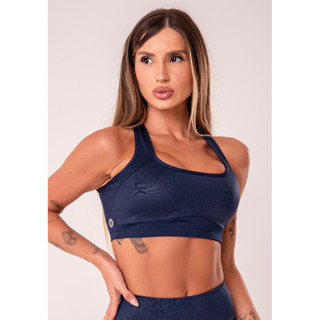TOP FITNESS FEMININO COM BOJO E RECORTES LOGOMANIA REFLECTIONS DLK em Oferta na Shopee
