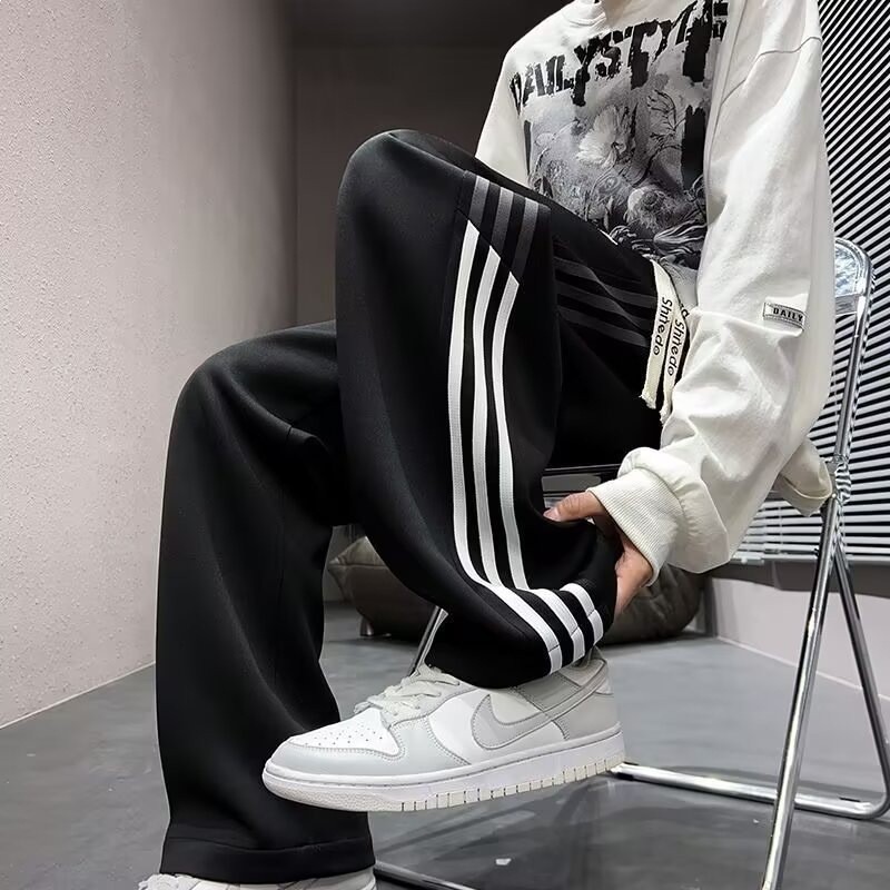 Calças casuais de perna reta masculinas primavera novo estilo na moda calças listradas meninos solto Drape Sweatpants ju