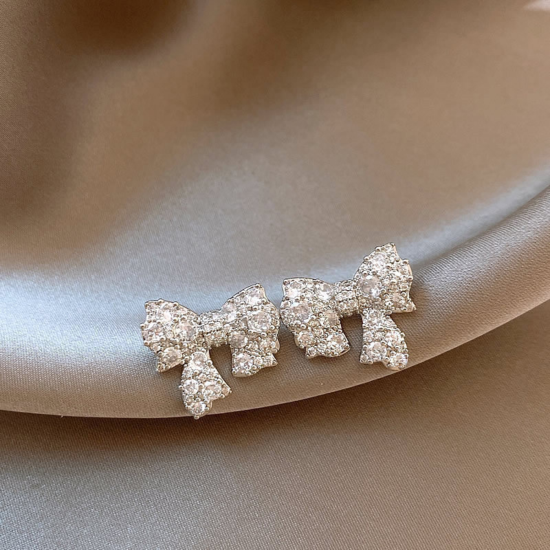 2024 novo estilo legal piscando diamante arco brincos nicho Design High-End brincos luz luxo moda brincos femininos
