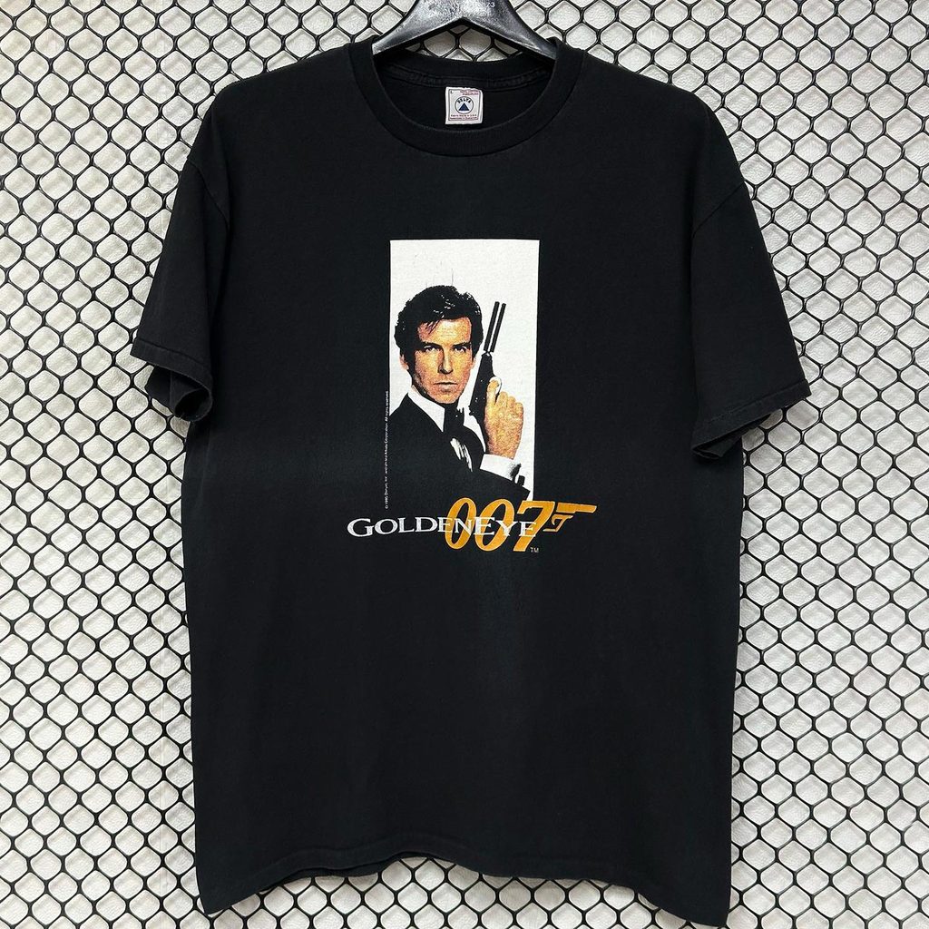 Camiseta Unissex Oversized Plus Size Feminina Masculina Golden Eye 007 James Bond Filme Clássico Retrô Estampada Confort