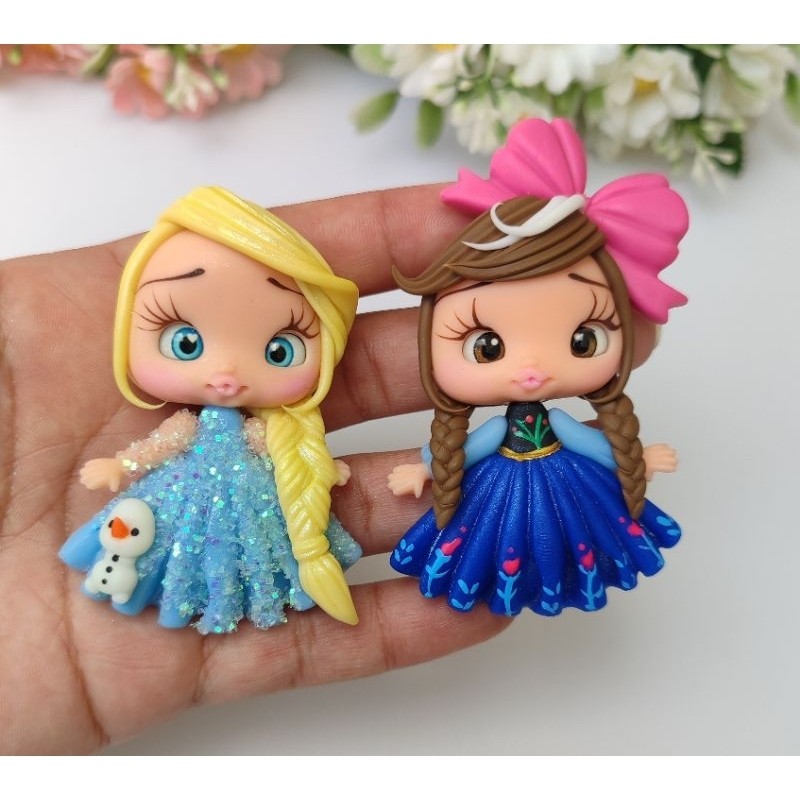 kit 2 apliques bonequinhas de biscuit para laço Ana Elza em Oferta na Shopee