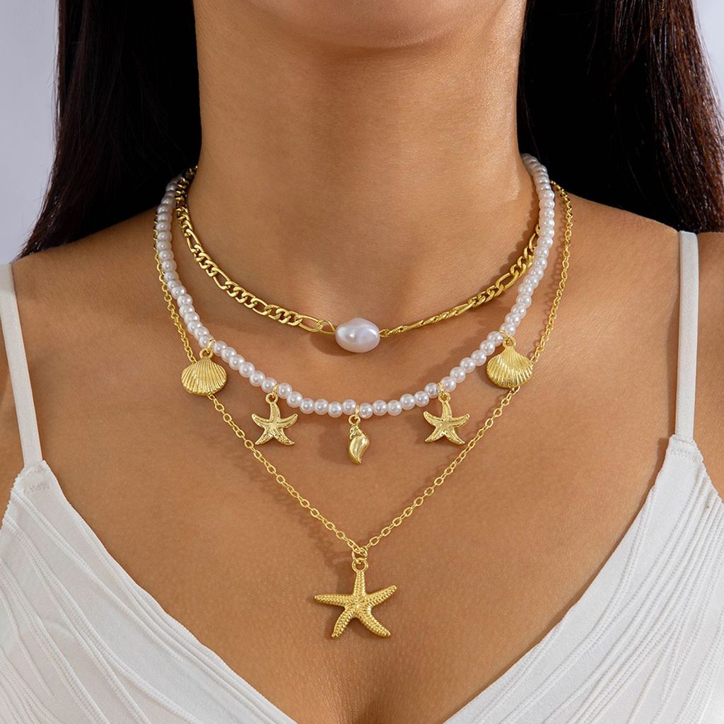 Colar de pérolas em formato de estrela-do-mar com várias camadas perfeito para férias de verão na praia