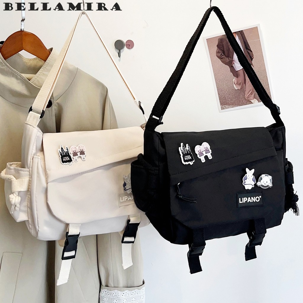 💧 Bolsa Transversal Unissex | Nylon À Prova D'água | Brinde De Pins Inclusos | Estilo Urbano Moderno ✨ em Oferta na Shopee