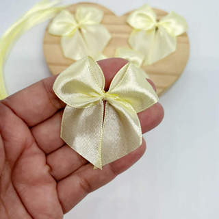 Laço Lacinho AMARELO BEBÊ em Cetim 20/40/100 UNIDADES - nº5 - 5 cm COM FITA PARA AMARRAR em Oferta na Shopee