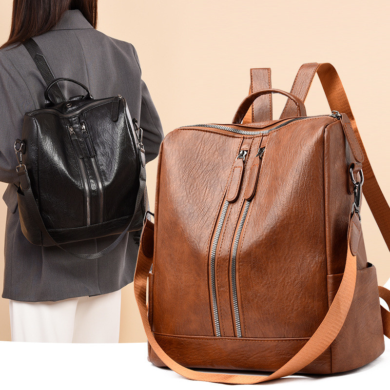 Nova Mochila Feminina De Antifurto Couro Macio PU Mochila De Viagem De Negócios Repelente De Água