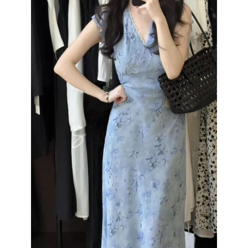 Temperamento francês azul vestido Floral feminino verão 2026 novo estilo férias fino-ajuste mais magro olhar bonito croc